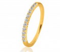 Alianza de oro amarillo ó blanco de 0,24 ct y diamantes engastados en garras 